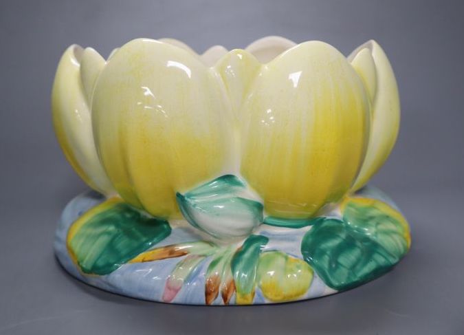 A group of post-war Clarice Cliff including a My Garden vase and jug, Water Lily bowl, 21cm wide, Celtic Harvest jug and two 1930s jugs